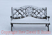 Snow Covered Park Bench